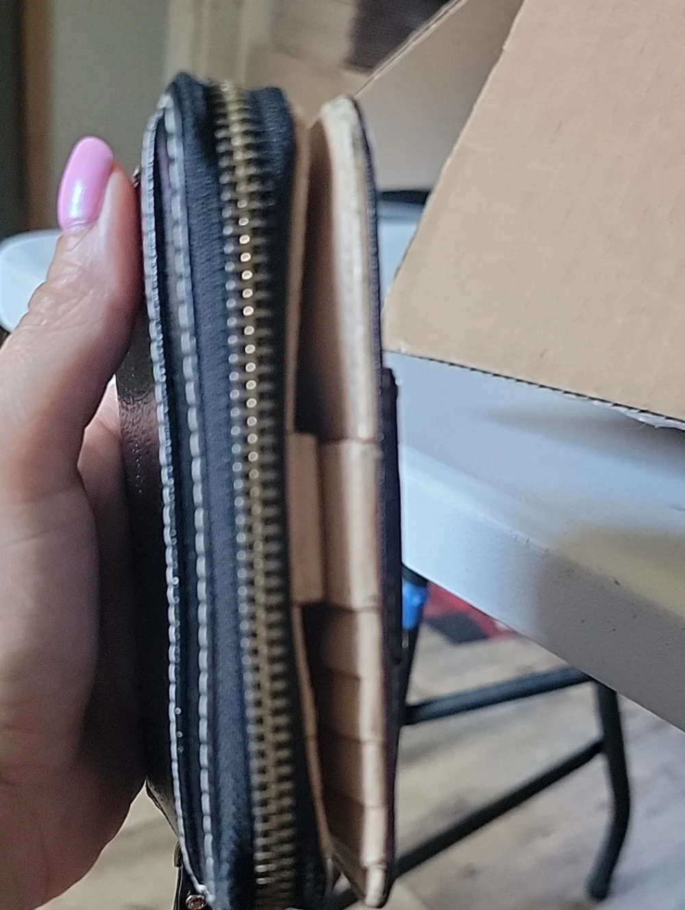 kate spade Black Pebbled Zip-Around Wallet with Gold Hardware